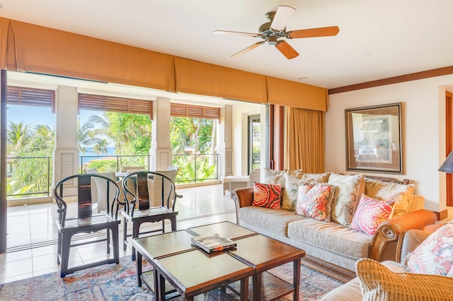 tiled living room featuring ceiling fan