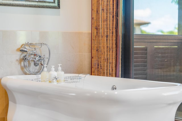 bathroom featuring tile walls