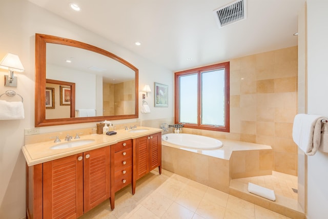 bathroom with independent shower and bath, tile patterned flooring, and vanity