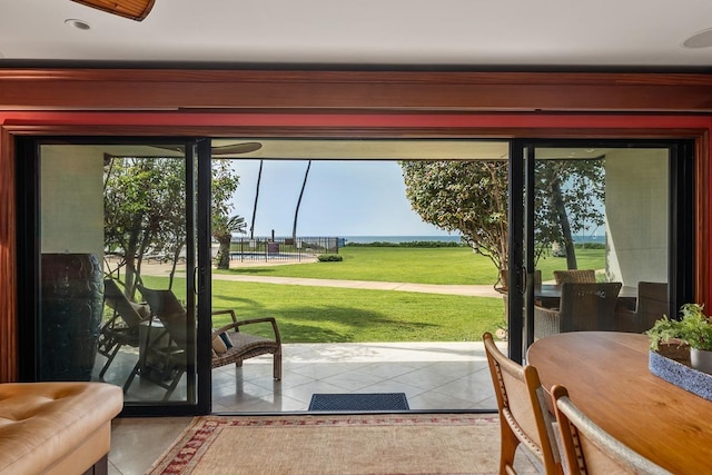 doorway to outside featuring tile patterned floors