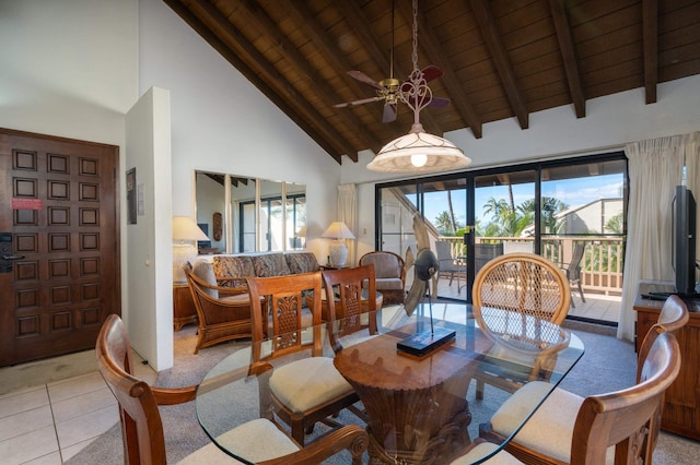 dining room with wooden ceiling, high vaulted ceiling, ceiling fan, light tile patterned floors, and beam ceiling