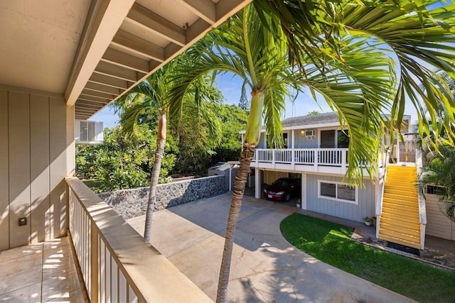 view of patio / terrace featuring stairs