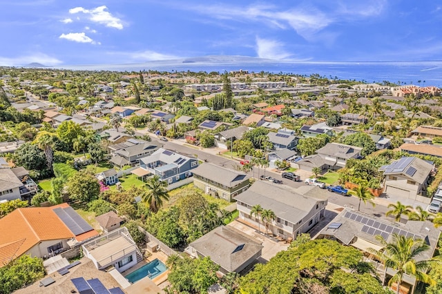 bird's eye view featuring a water view and a residential view