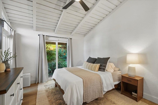 bedroom with light wood finished floors, wood ceiling, a ceiling fan, and baseboards