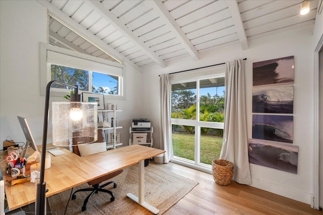 office area with healthy amount of natural light, wood finished floors, and wooden ceiling