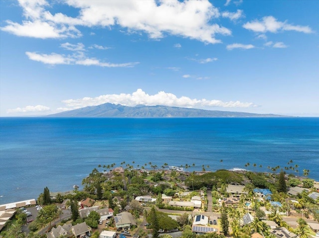 drone / aerial view of a water and mountain view