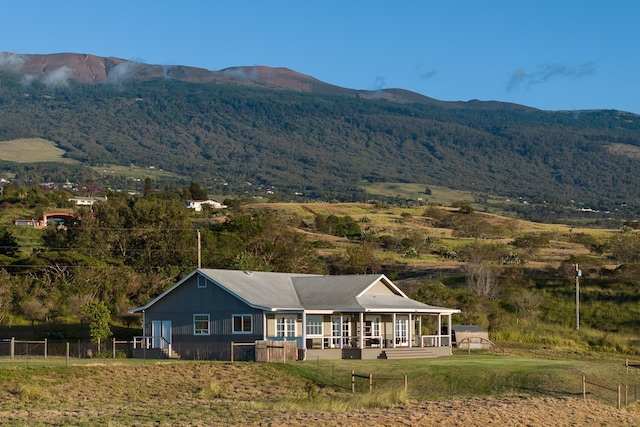 exterior space featuring a mountain view