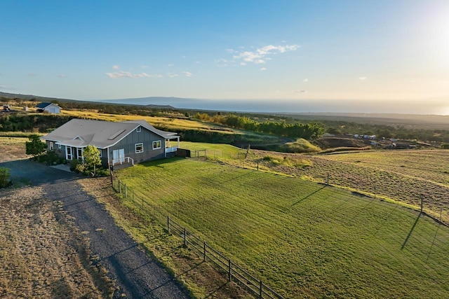 birds eye view of property with a rural view