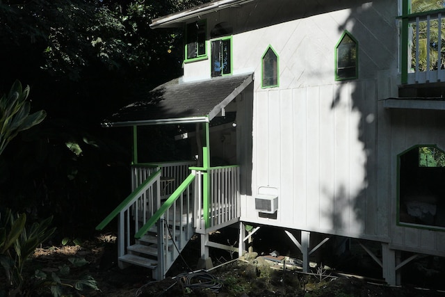 view of property exterior featuring a wooden deck