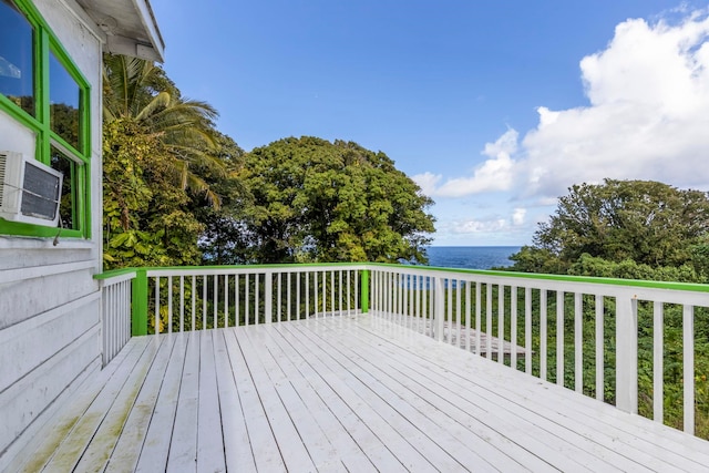 wooden terrace featuring a water view