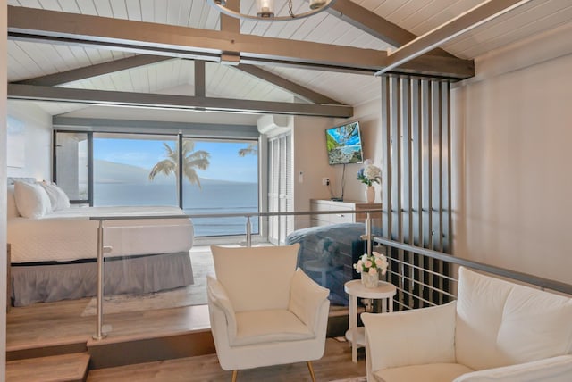 sunroom featuring beamed ceiling