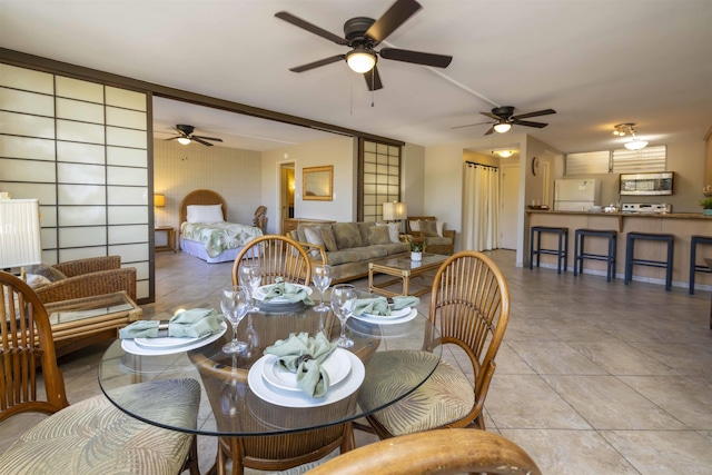 dining room featuring light tile patterned floors