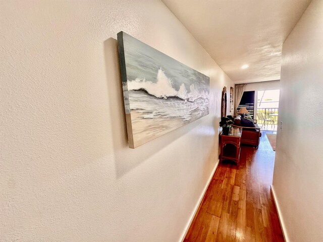 hallway featuring hardwood / wood-style flooring