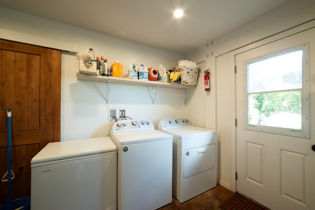 clothes washing area featuring washing machine and dryer