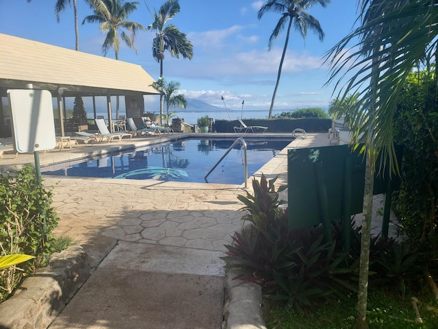 view of pool featuring a patio area