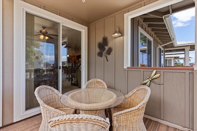 exterior space featuring ceiling fan