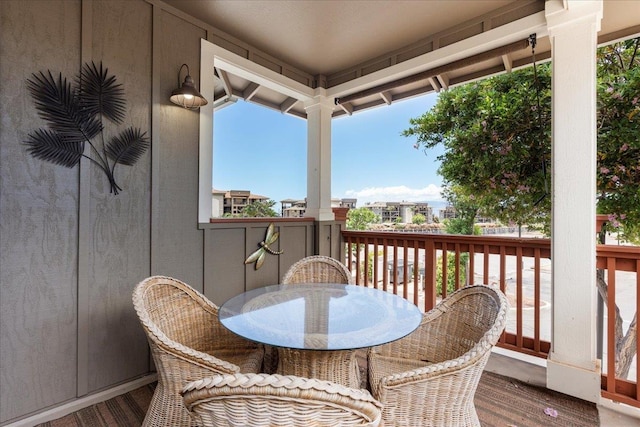 wooden balcony featuring a deck