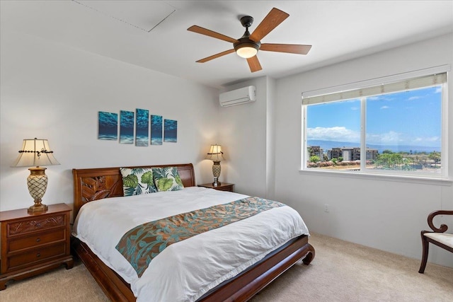 carpeted bedroom with ceiling fan and a wall mounted air conditioner