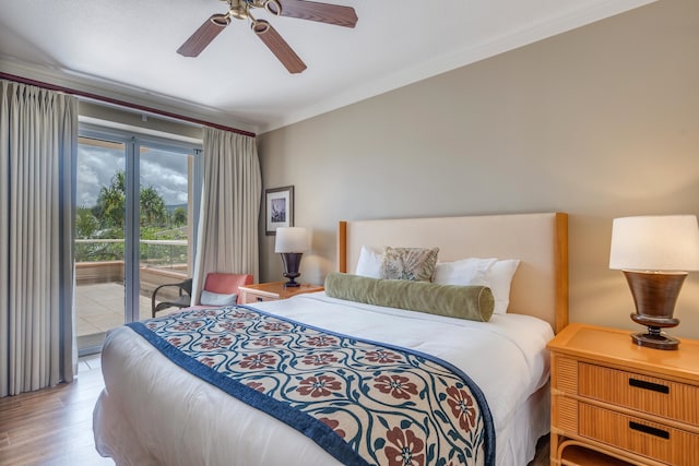 bedroom featuring ceiling fan, hardwood / wood-style floors, crown molding, and access to outside