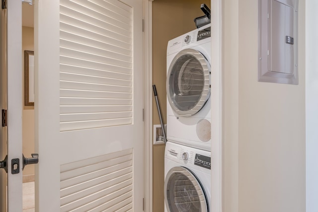 laundry area featuring stacked washing maching and dryer and hookup for a washing machine