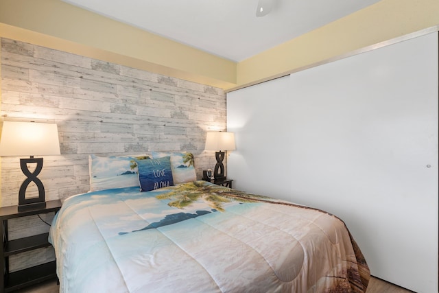 2219 S Kihei Rd Unit B312, Kihei, HI 96753 - bedroom featuring wood walls and a closet