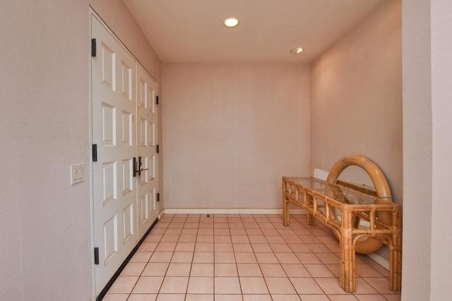 entryway featuring light tile patterned floors