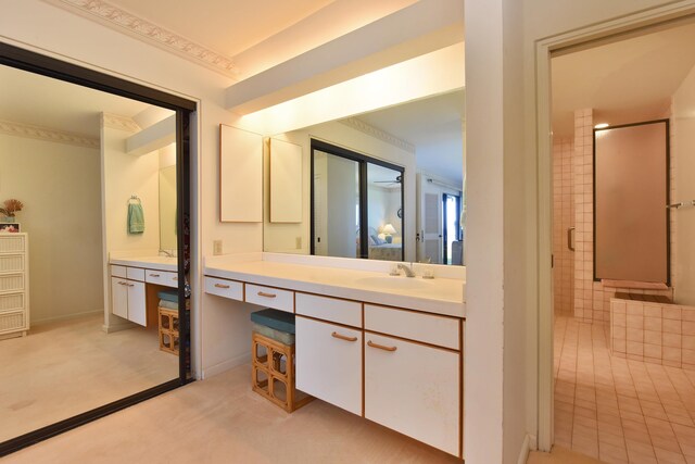 bathroom with vanity and an enclosed shower