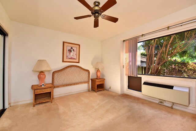 unfurnished room with ceiling fan and light colored carpet