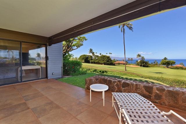 view of patio / terrace with a water view