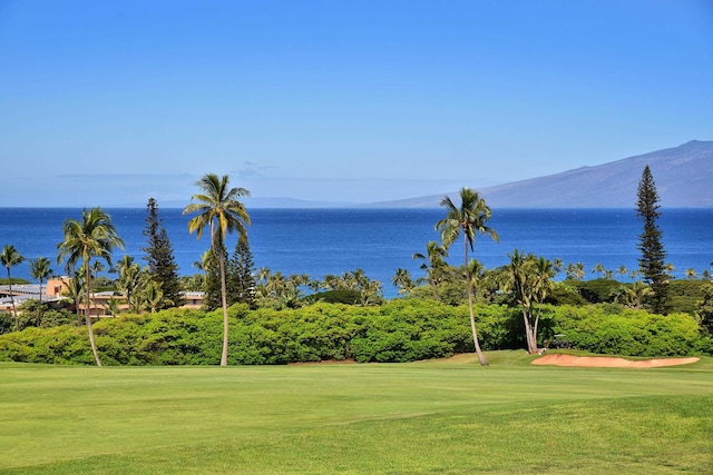 50 Puu Anoano St Unit 703, Lahaina, HI 96761 - view of property's community featuring view of golf course, a lawn, and a water view