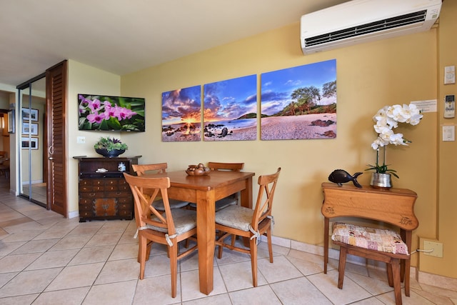 tiled dining room featuring an AC wall unit