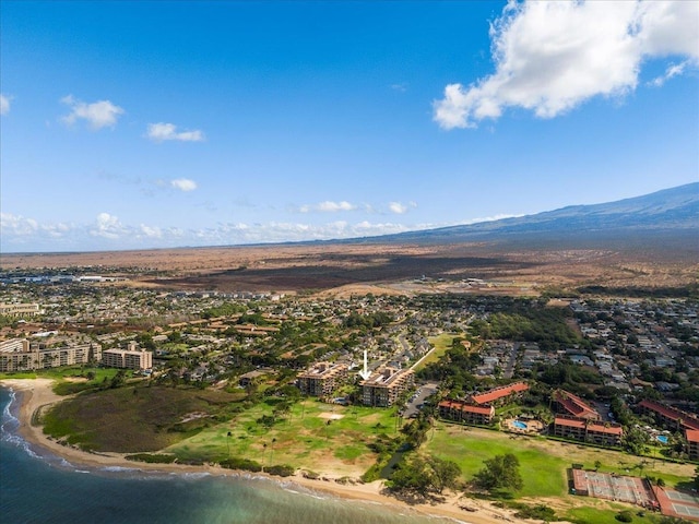 birds eye view of property featuring a water and mountain view