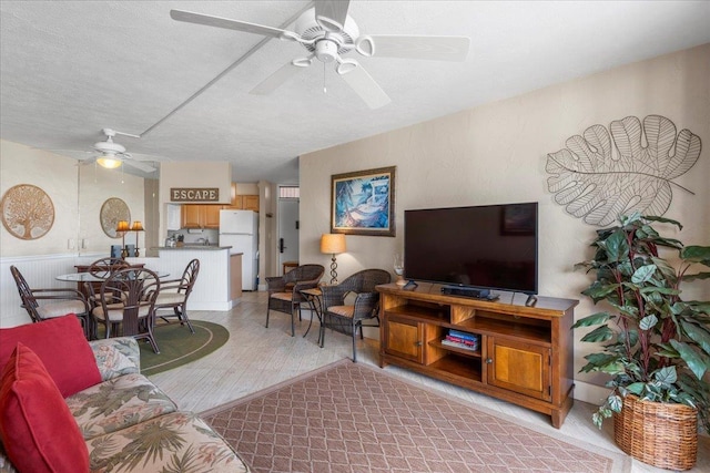 living room with a textured ceiling