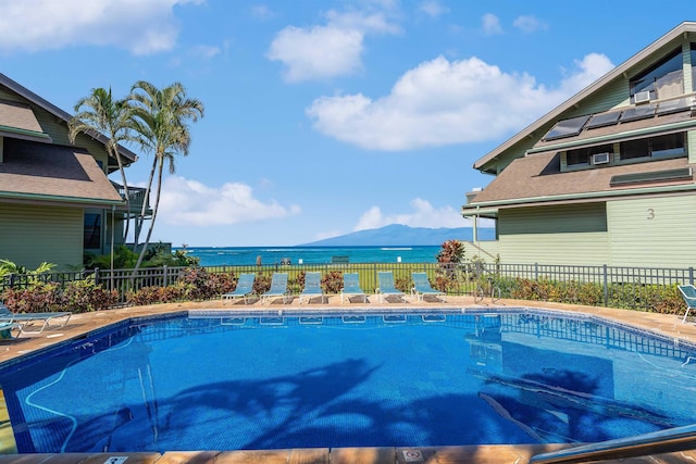 view of pool featuring a water and mountain view