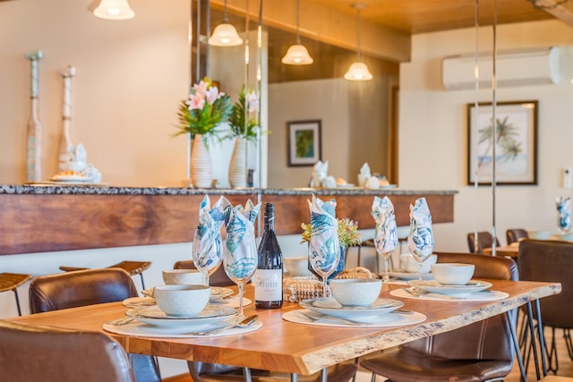 dining room with a wall mounted AC