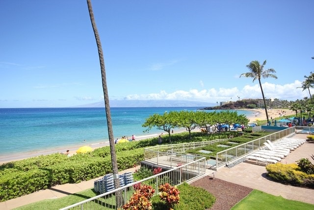 view of water feature with a beach view