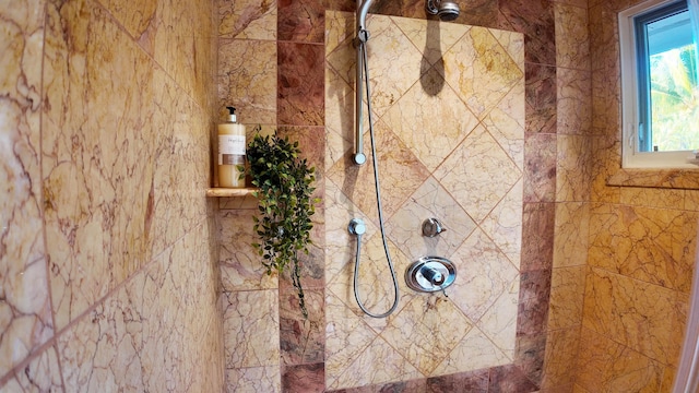 room details featuring a fire extinguisher and a tile shower