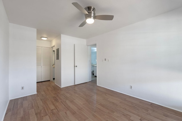 unfurnished room with light hardwood / wood-style floors and ceiling fan