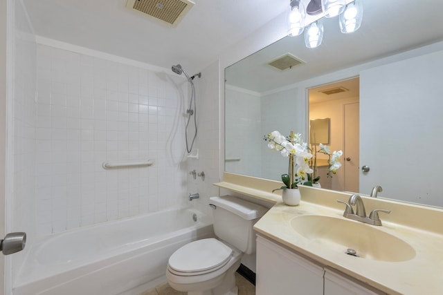 full bathroom featuring tiled shower / bath combo, vanity, and toilet