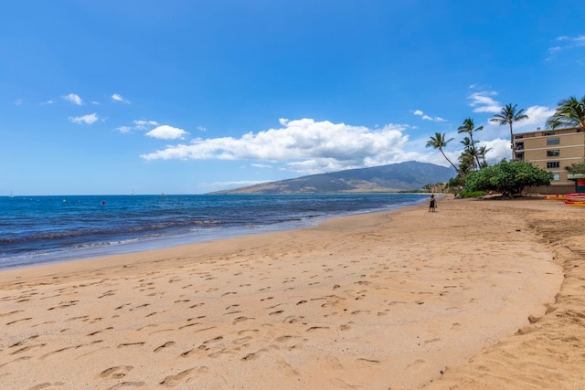 property view of water featuring a beach view and a mountain view