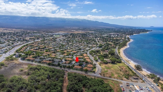 bird's eye view with a water and mountain view