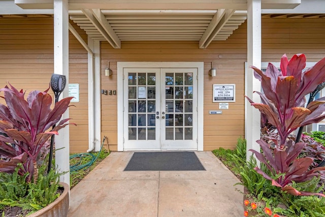 entrance to property featuring french doors