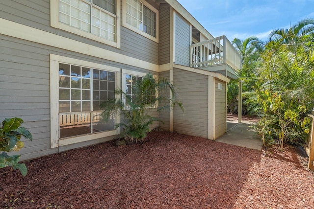 exterior space featuring a balcony and a patio