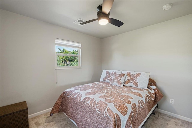 33 Hoku Pl, Paia, HI 96779 - bedroom with carpet, baseboards, and a ceiling fan