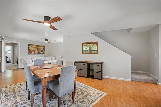 33 Hoku Pl, Paia, HI 96779 - dining room featuring light wood finished floors, a ceiling fan, and baseboards