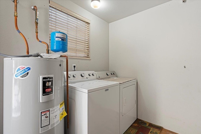 33 Hoku Pl, Paia, HI 96779 - laundry area with electric water heater and washer and dryer