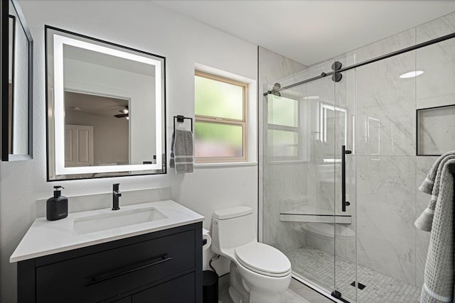 33 Hoku Pl, Paia, HI 96779 - bathroom featuring toilet, vanity, and a marble finish shower