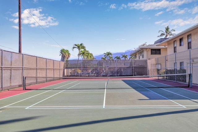 view of sport court featuring basketball hoop