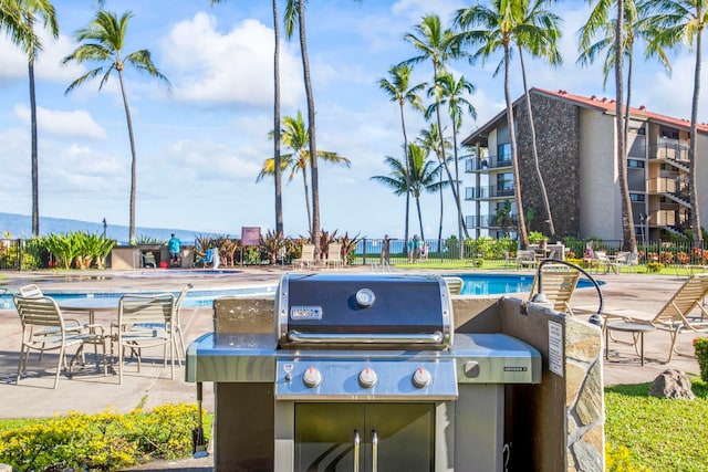 exterior space with a patio and area for grilling