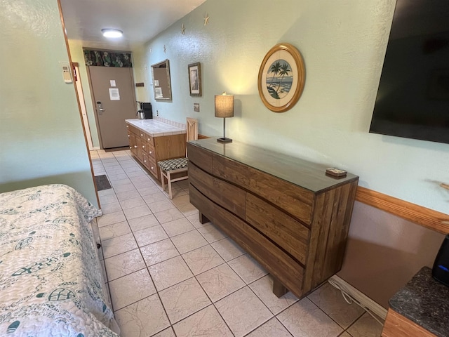 715 S Kihei Rd Unit D144, Kihei, HI 96753 - bedroom featuring light tile patterned floors and baseboards